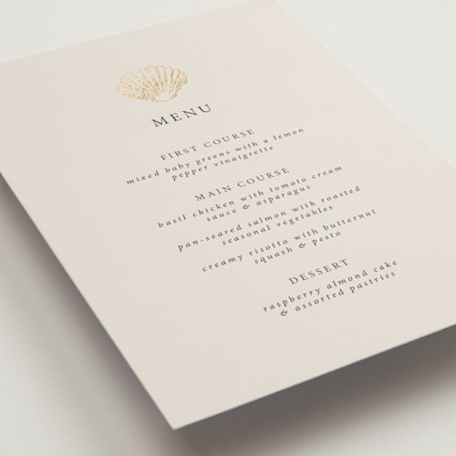 This is a sand menu cards with foil pressed by Hannah Bowman called simple seashell printing on signature in 5x7
