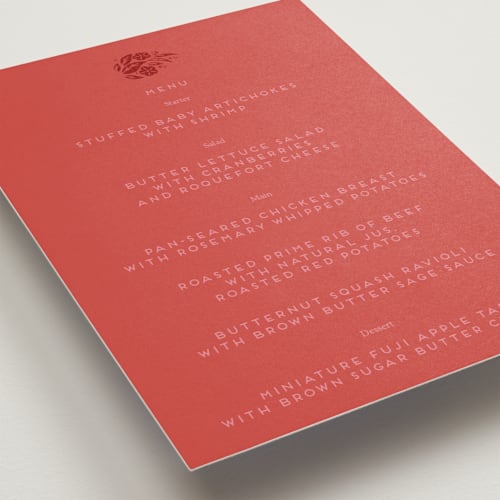 This is a ruby menu cards with foil pressed by Ghia Designs called fiery printing on signature in standard