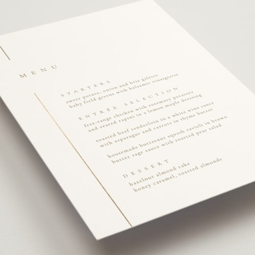 This is a brass menu cards with foil pressed by Kelly Schmidt called london printing on signature in standard