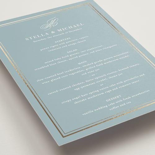 This is a powder blue menu cards with foil pressed by Jennifer Postorino called polished printing on signature in 5x7
