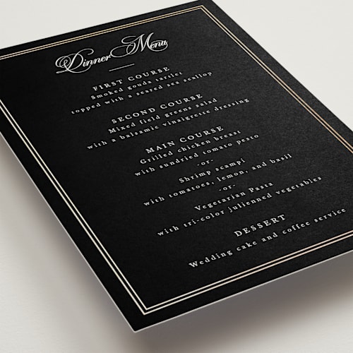 This is a coal menu cards with foil pressed by Sarah Brown called traditionalist printing on signature in standard