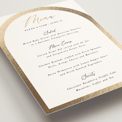 This is a ivory menu cards with foil pressed by Hooray Creative called gold trim printing on signature in standard