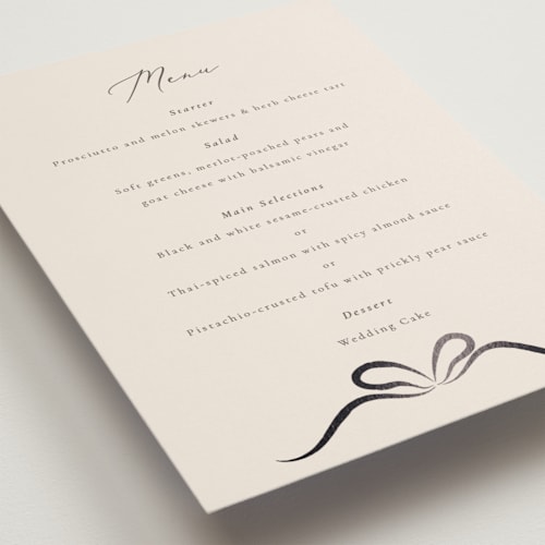 This is a tuxedo menu cards with foil pressed by Corinne Malesic called bow printing on signature in standard