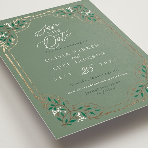This is a evergreen foil stamped save the date cards with foil pressed by Alethea and Ruth called illuminated storybook printing on signature in standard