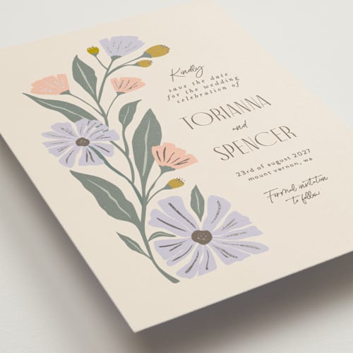 This is a periwinkle foil stamped save the date cards with foil pressed by Karidy Walker called storybook garden printing on signature in standard