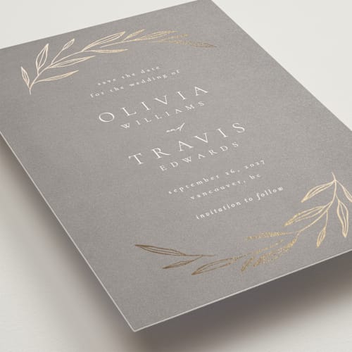 This is a mist foil stamped save the date cards with foil pressed by Kelly Schmidt called leaves printing on signature in standard