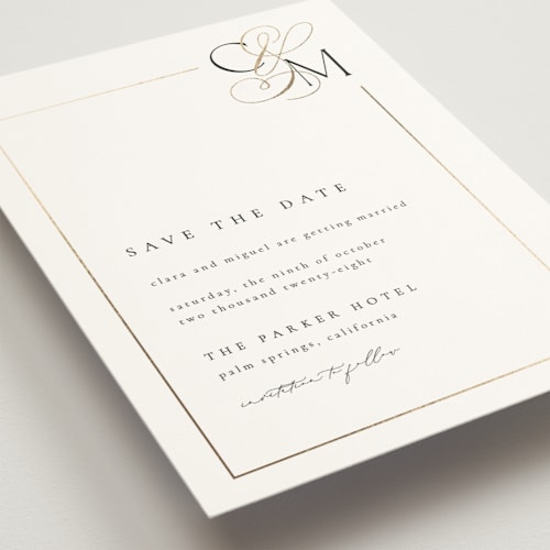 This is a silk foil stamped save the date cards with foil pressed by Kelly Schmidt called golden ampersand printing on signature in standard