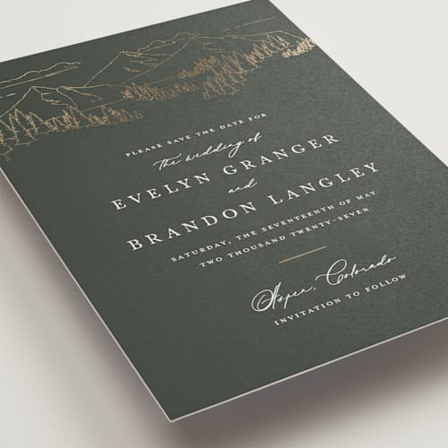 This is a hunter foil stamped save the date cards with foil pressed by Sarah Brown called peaks printing on signature in standard