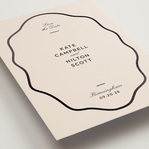 This is a ink foil stamped save the date cards with foil pressed by Megan Davis called croquet printing on signature in standard