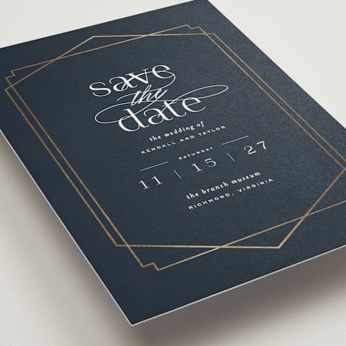 This is a navy foil stamped save the date cards with foil pressed by Carly Reed Walker called vision printing on signature in standard