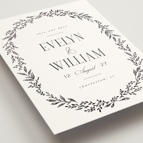 This is a snow foil stamped save the date cards with foil pressed by Laura Hankins called wildflora printing on signature in standard