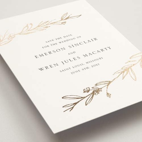 This is a ivory foil stamped save the date cards with foil pressed by Mere Paper called metallic branches printing on signature in standard