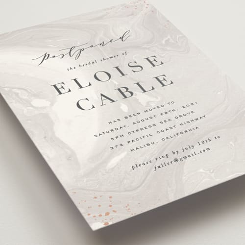 This is a taupe save the date with standard by Hooray Creative called moody marbling printing on signature in standard