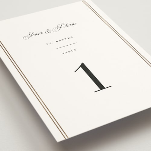 This is a silk table numbers with foil pressed by Carolyn MacLaren called scripted striped printing on doublethick in standard