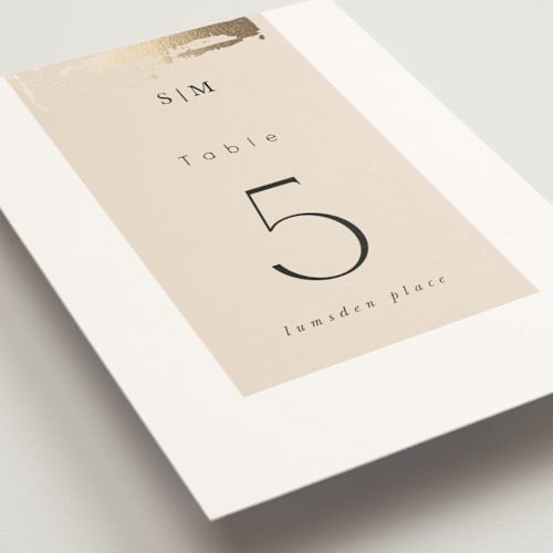 This is a blush table numbers with foil pressed by Hannah Williams called modern serene printing on doublethick in standard