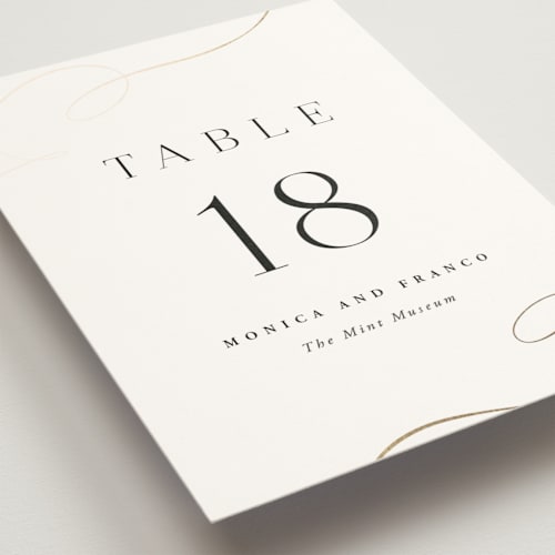 This is a cloud table numbers with foil pressed by Hooray Creative called and centered printing on doublethick in standard