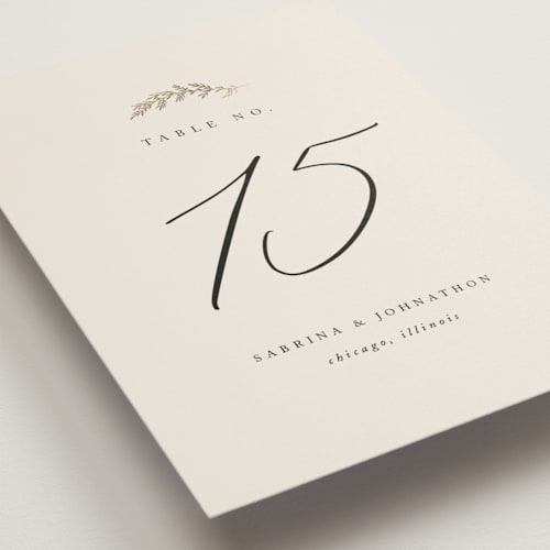 This is a ivory table numbers with foil pressed by Carolyn Nicks called to hold printing on doublethick in standard