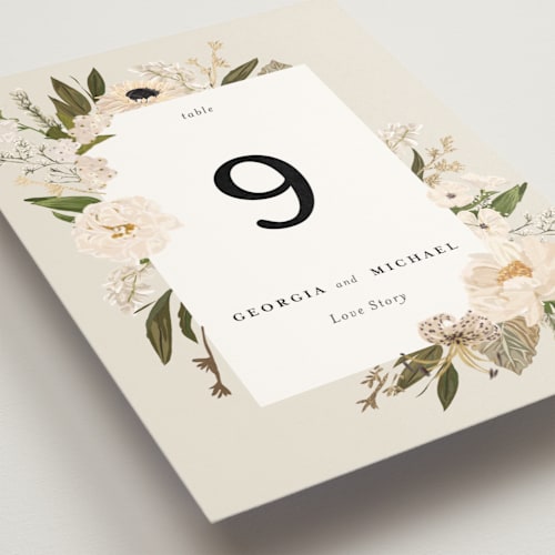This is a champagne table numbers with foil pressed by Susan Moyal called harmony printing on doublethick in standard
