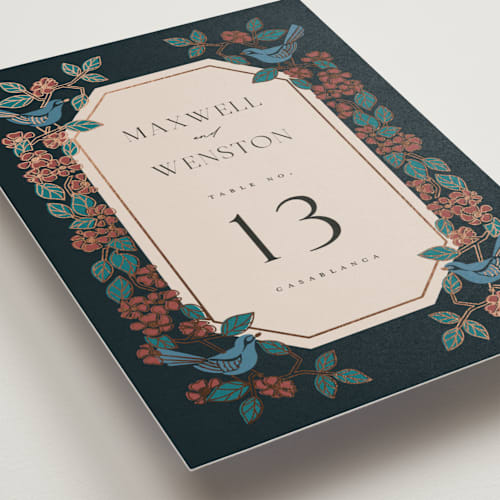 This is a onyx table numbers with foil pressed by Ana de Sousa called wedding birds printing on doublethick in standard