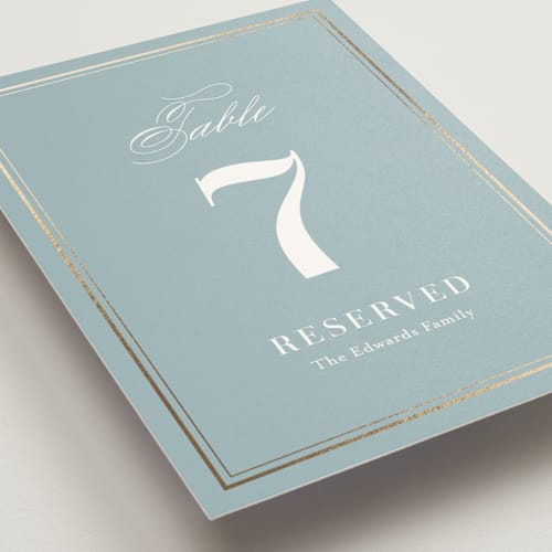 This is a powder blue table numbers with foil pressed by Jennifer Postorino called polished printing on doublethick in standard