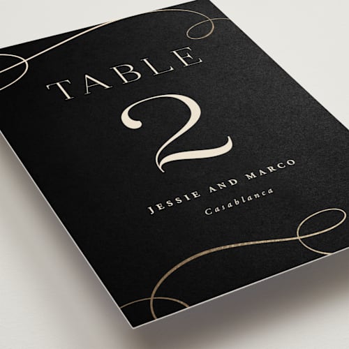 This is a onyx table numbers with foil pressed by Hooray Creative called black tie affair printing on doublethick in standard