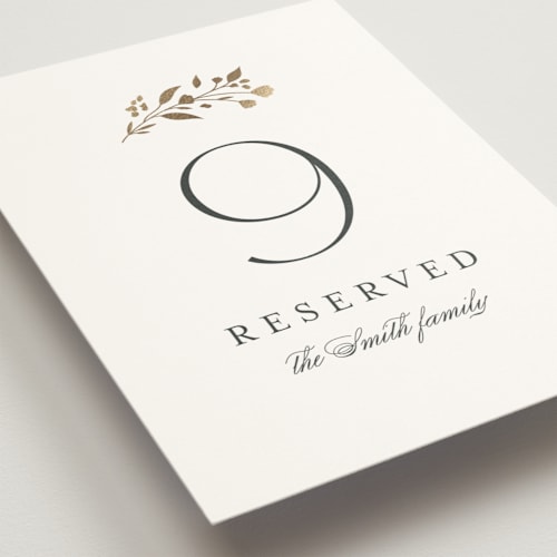 This is a cloudy table numbers with foil pressed by Jennifer Postorino called embrace printing on doublethick in standard