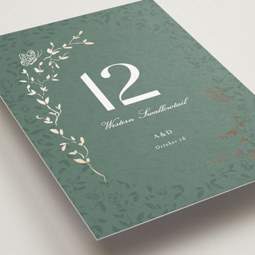 This is a eucalyptus table numbers with foil pressed by Simona Camp called southern romance printing on doublethick in standard