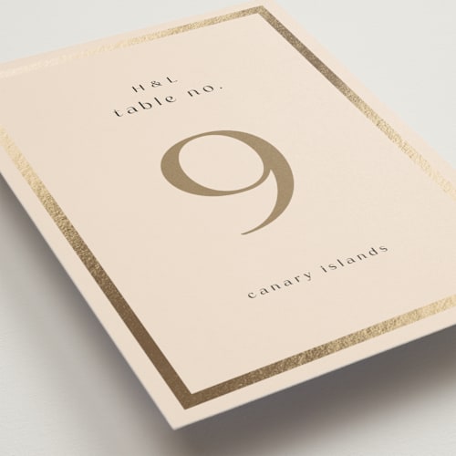 This is a latte table numbers with foil pressed by Stacy Maalouf called framed photo printing on doublethick in standard