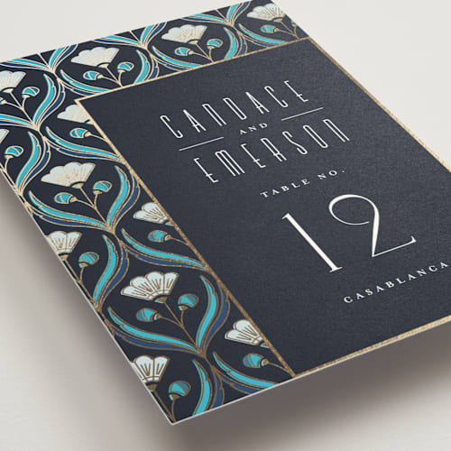 This is a cote d'azur table numbers with foil pressed by Ana de Sousa called deco pattern printing on doublethick in standard
