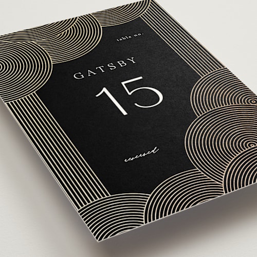 This is a onyx table numbers with foil pressed by Lori Wemple called ionic printing on doublethick in standard