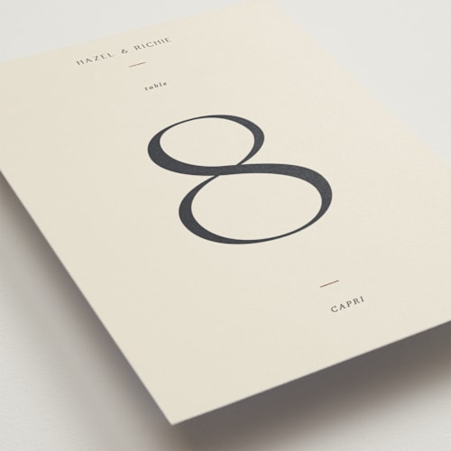 This is a linen table numbers with foil pressed by Blustery August called walnut printing on doublethick in standard