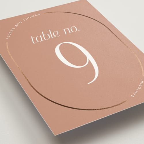 This is a clay table numbers with foil pressed by Morgan Kendall called unity printing on doublethick in standard