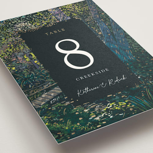 This is a emerald table numbers with foil pressed by Becky Nimoy called by the creek printing on doublethick in standard