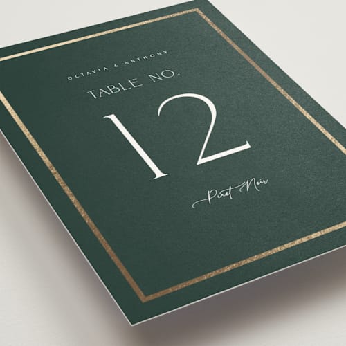 This is a evergreen table numbers with foil pressed by Nicole Walsh called regal printing on doublethick in standard
