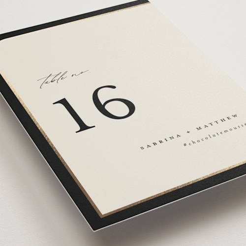 This is a black tie table numbers with foil pressed by Carolyn Nicks called tuxedo printing on doublethick in standard