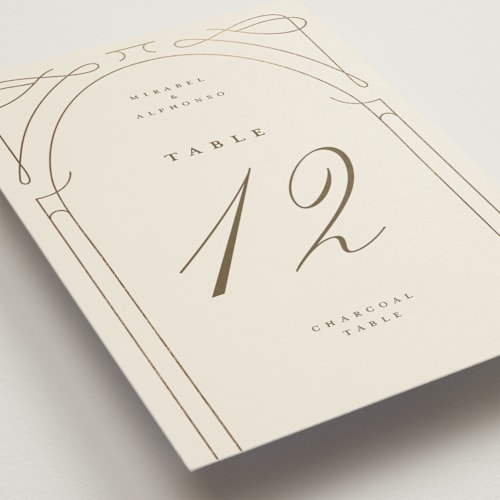 This is a cream table numbers with foil pressed by Katie Zimpel called simple art nouveau printing on doublethick in standard