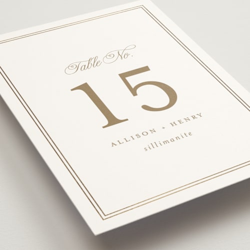 This is a porcelain table numbers with foil pressed by Mansi Verma called chic monogram printing on doublethick in standard