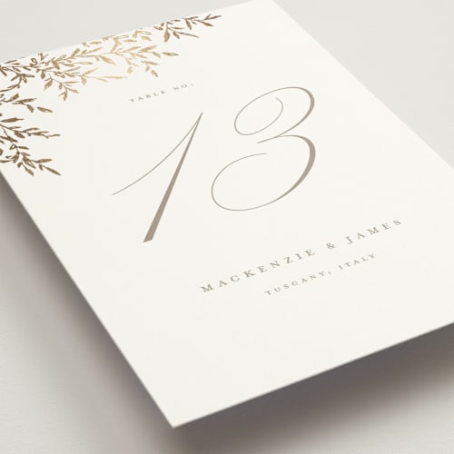 This is a chantilly table numbers with foil pressed by Wildfield Paper Co called romantic wreath printing on doublethick in standard