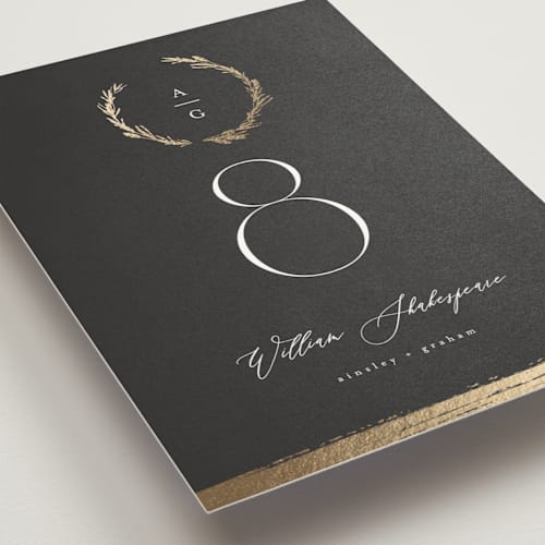 This is a onyx table numbers with foil pressed by Kristie Kern called panache printing on doublethick in standard