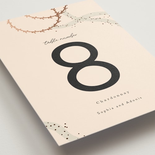 This is a linen table numbers with foil pressed by Maria Hilas-Louie called stefana printing on doublethick in standard