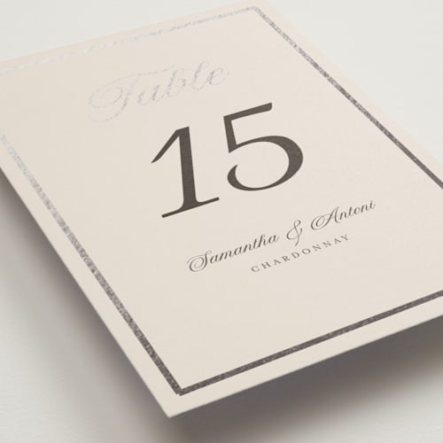 This is a antique table numbers with foil pressed by Nicole Walsh called tux printing on doublethick in standard