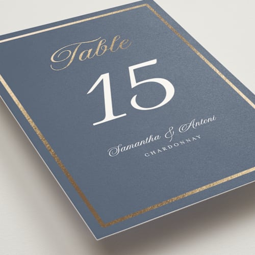 This is a cornflower table numbers with foil pressed by Nicole Walsh called tux printing on doublethick in standard
