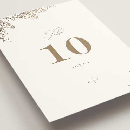 This is a porcelain table numbers with foil pressed by Leah Bisch called reflection printing on doublethick in standard