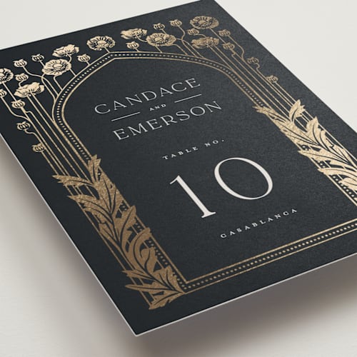 This is a navy table numbers with foil pressed by Ana de Sousa called nouveau flowers printing on doublethick in standard