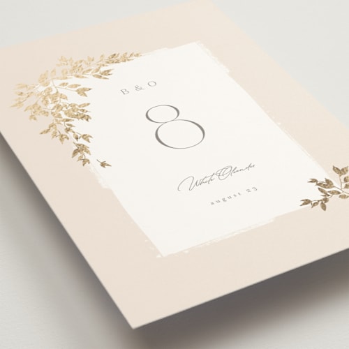 This is a latte table numbers with foil pressed by Kristie Kern called everly printing on doublethick in standard
