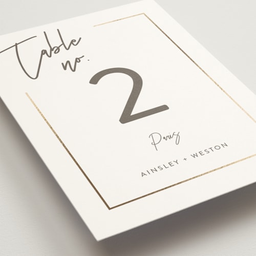 This is a milk white table numbers with foil pressed by Robin Ott called balanced printing on doublethick in standard