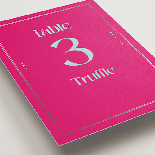 This is a dragon fruit table numbers with foil pressed by Claudia Orengo called news! printing on doublethick in standard