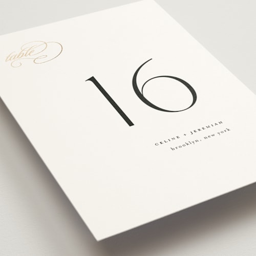 This is a silk table numbers with foil pressed by Kelly Schmidt called left align printing on doublethick in standard