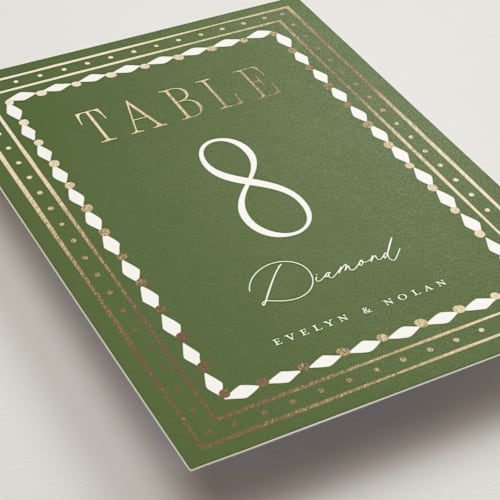 This is a periwinkle table numbers with foil pressed by Erin German called sadie printing on doublethick in standard