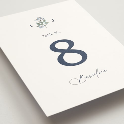 This is a sapphire table numbers with foil pressed by Olivia Raufman called climbing florals printing on doublethick in standard